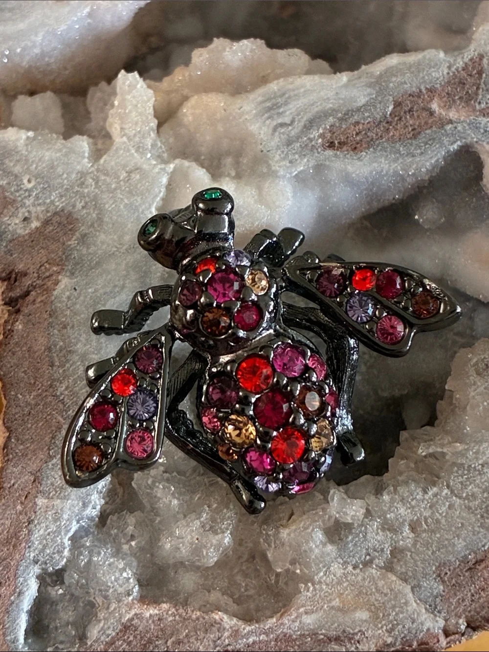 Joan Rivers red and pink rhinestone bee brooch in Japaned metal tone